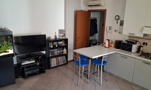 Soggiorno con cucina a vista