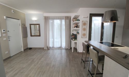 Soggiorno con cucina a vista