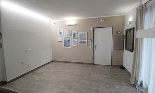Soggiorno con cucina a vista