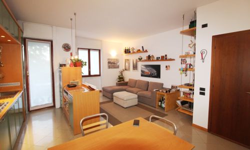 Soggiorno con cucina a vista