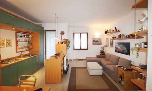 Soggiorno con cucina a vista