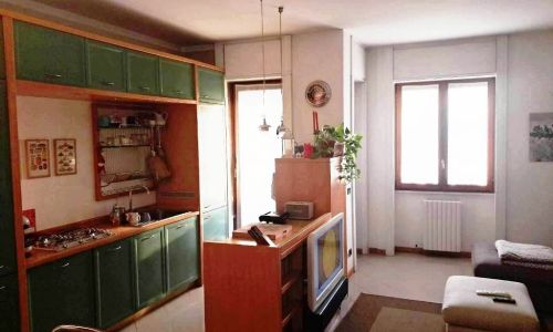 Soggiorno con cucina a vista
