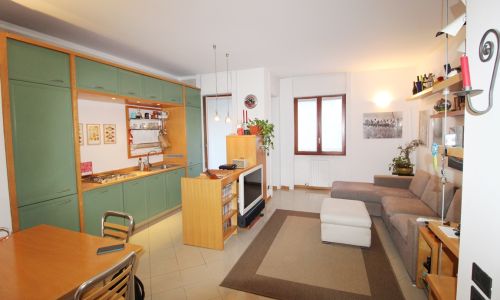Soggiorno con cucina a vista